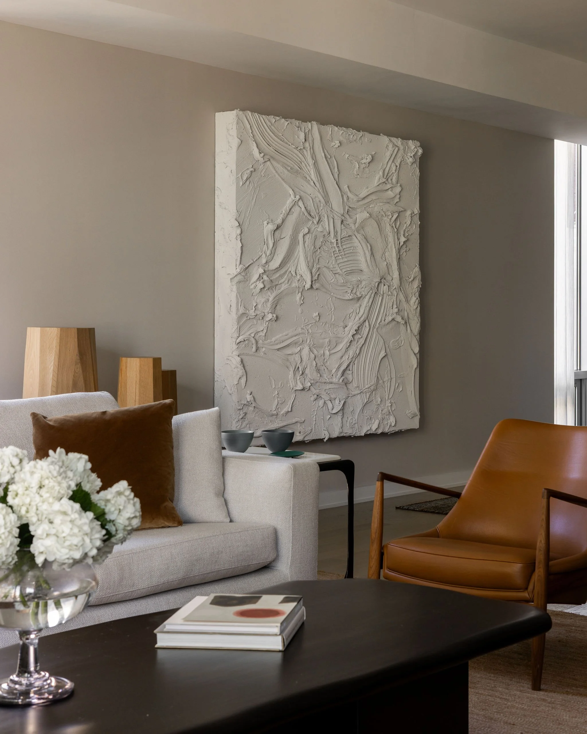 Georgetown condo living room featuring a commissioned Jason Martin painting from Lisson Gallery, Minotti sofa, Seal chair, and custom coffee table.